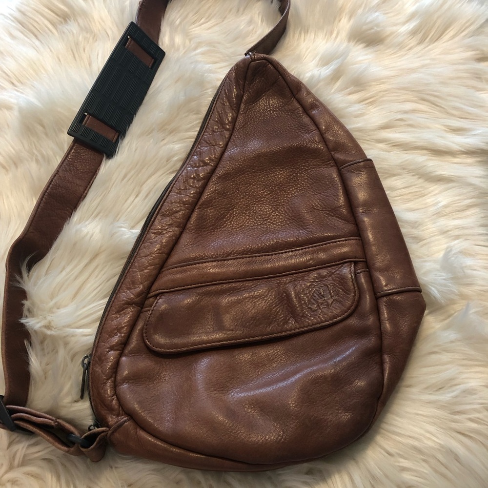 Ameribag brown leather sling bag
Unisex